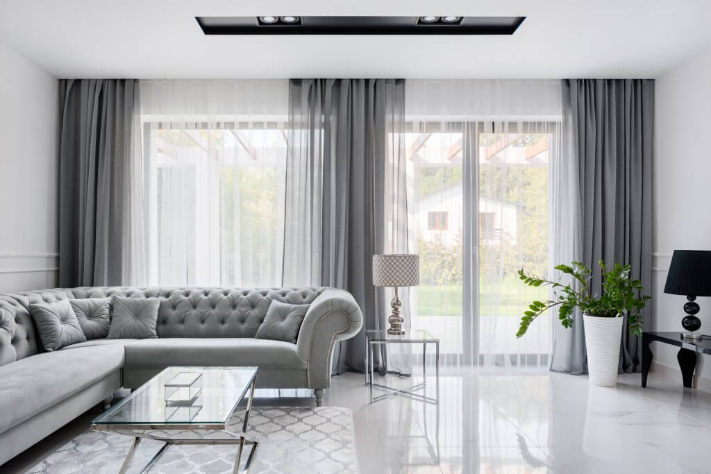 living room with tile flooring